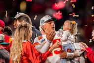 Mahomes, Brittany and Sterling are covered in red and yellow confetti. Source: Patrick Mahomes IG